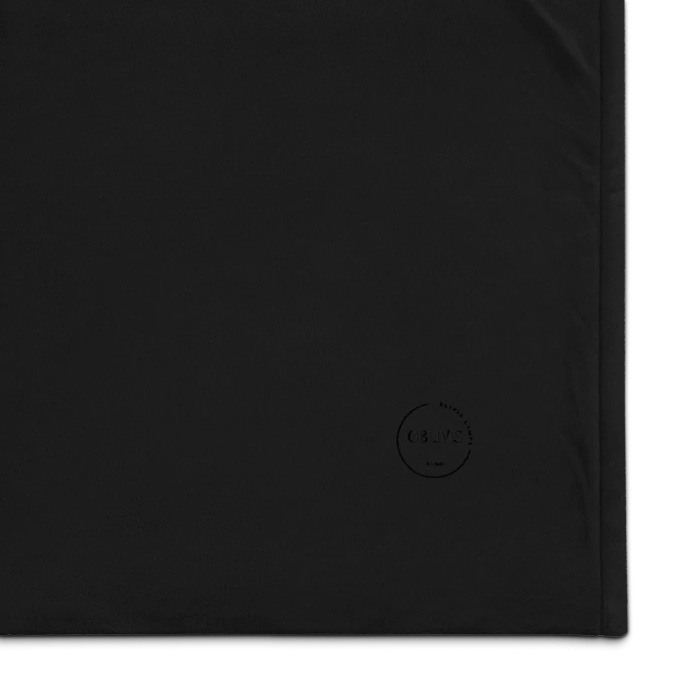 Black fabric with a logo in the corner