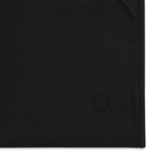 Black fabric with a logo in the corner