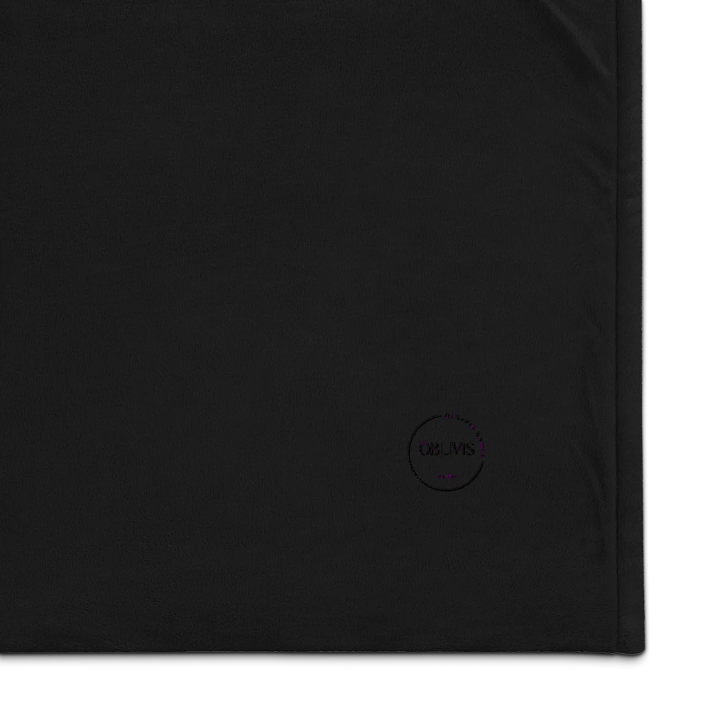 Black fabric with a small logo in the corner