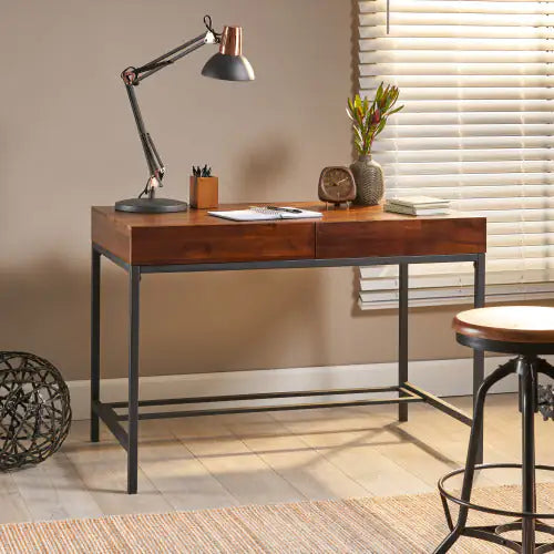 Oblivis modern sleek desk with oak wood top, metal legs, and central storage drawer in a home office setting